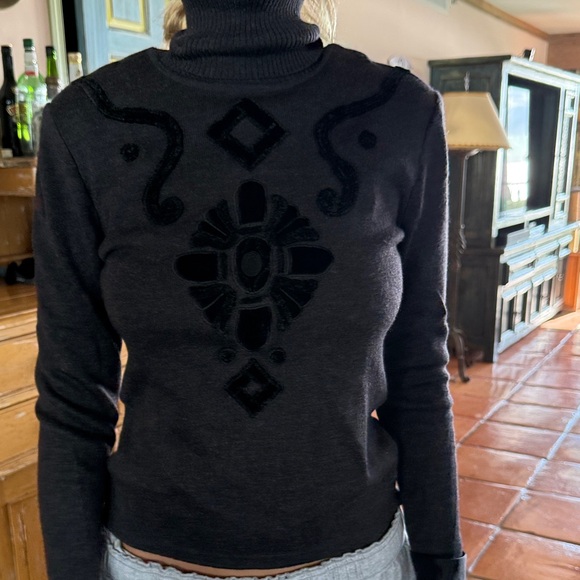 Loewe Sweaters - Loewe Black Turtleneck Sweater with Intricate Design
